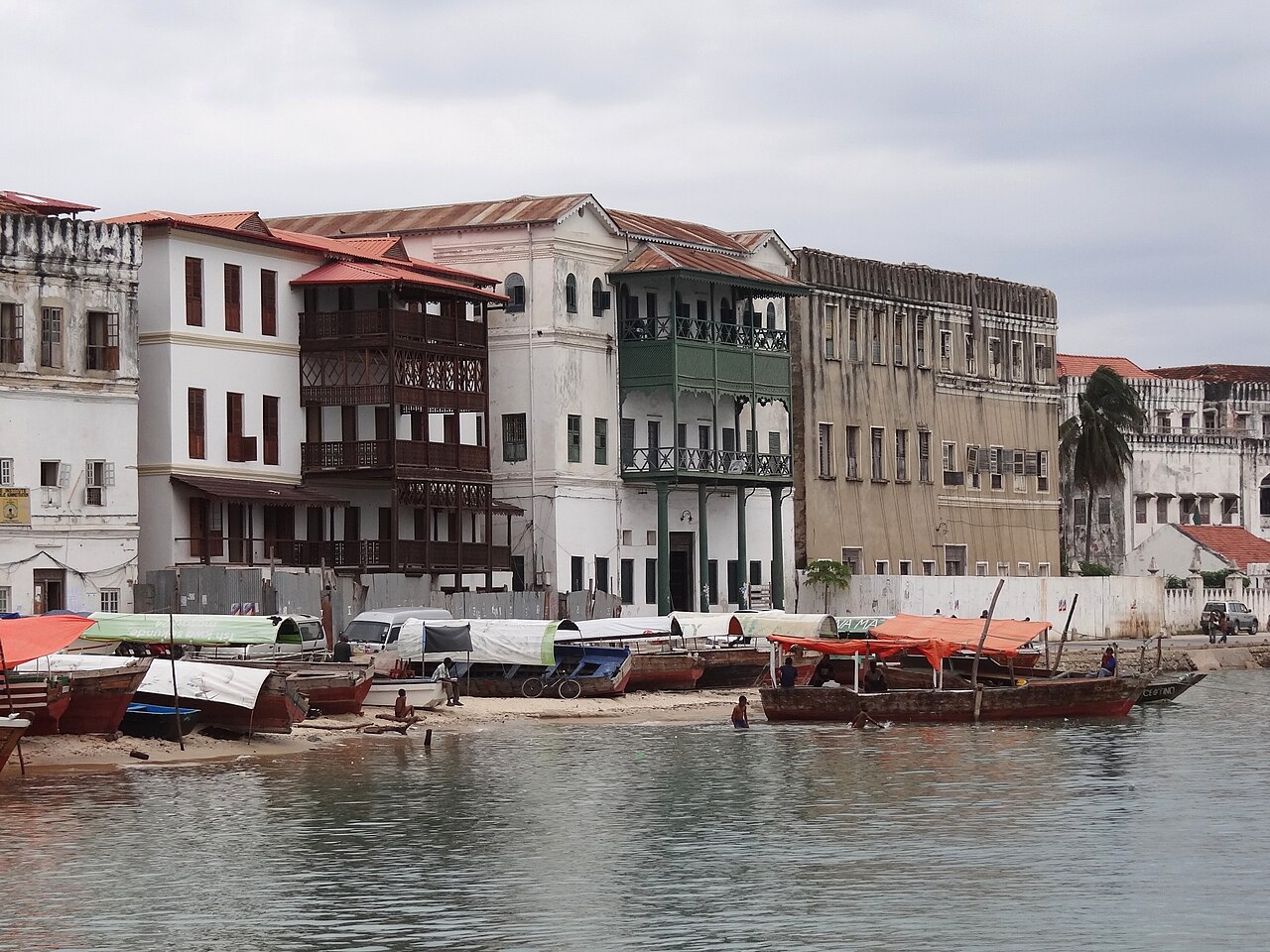 Historic Stone Town waterfront buildings beside the Indian Ocean in Zanzibar